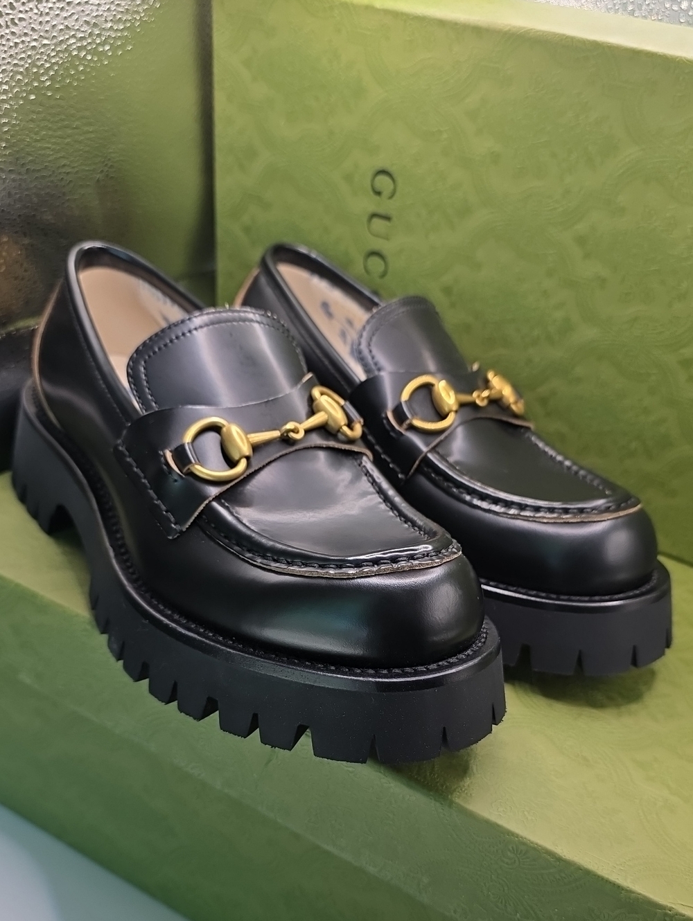 Gucci Black Leather Lug Sole Loafers with Gold Horsebit